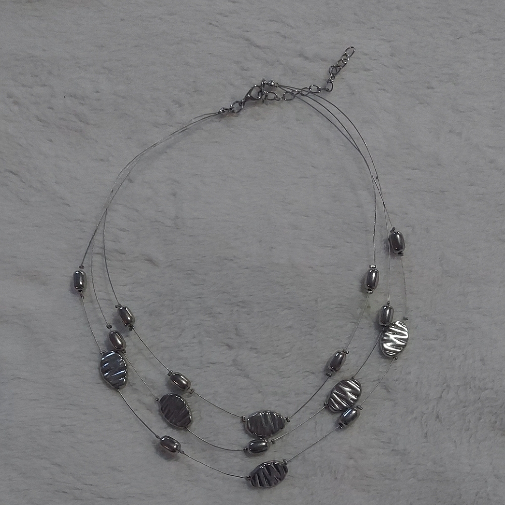 8/$10 Chic Multi-Layered Silver Necklace - Picture 4 of 4